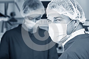 Attentive look of surgeon in mask