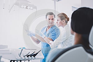 Attentive medical worker listening to his partner