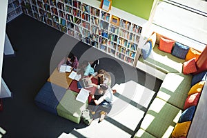 Attentive students studying in library