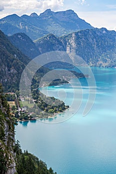 Attersee lake in Austria, seen from above, with a clear coastline, during a Summer holiday trip. European holiday destination