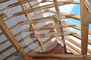 Attic Construction. Roofing Attic Construction Indoor. Wooden Roof Frame House Construction.