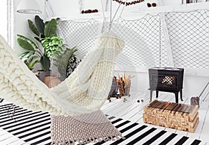 Attic interior design idea with hammock, scandinavian boho style