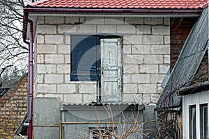 Attic of a private house made of gray bricks