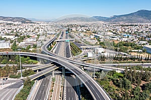 Attiki Odos toll road interchange and National highway in Attica, Athens, Greece. Aerial drone view