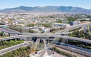 Attiki Odos toll road interchange and National highway in Attica, Athens, Greece. Aerial drone view photo