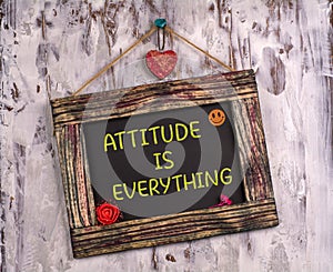 Attitude is everything written on Vintage sign board