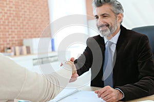 Attorney and client handshaking