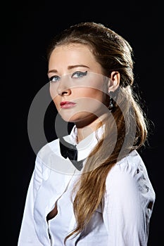 Attracive woman in white shirt and black tie