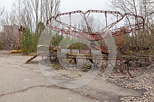 Attraction in amusement park in overgrown ghost city Pripyat.