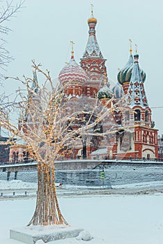 Attraction St. Basil`s Cathedral on Red Plozadi in Moscow, Russia. Winter view of the architecture