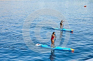 Attraction for tourists, sailing on a boat with a paddle in the red sea