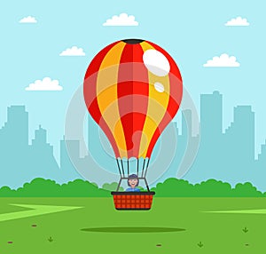 The attraction will rise into the air in a hot air balloon. a joyful aeronaut rises into the sky.