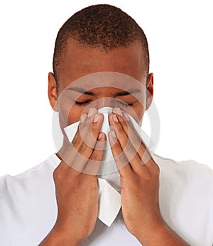 Attractiv black man using tissue