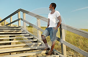 Attractive african american male smiling outdoors