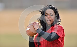 Attractive African American woman football player