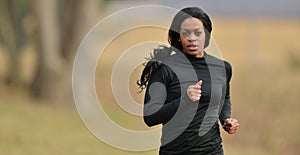 Attractive African American woman jogger runner