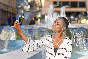 Attractive African woman posing for a selfie