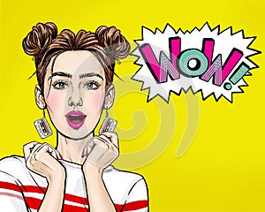 Attractive amazed young woman  with mobile phone in hand. Wow girl in comic style. Pop art woman holding smartphone.