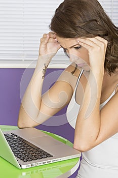 Attractive Annoyed Young Woman Contemplating Deciding Using Laptop Computer