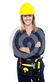 Attractive architect woman with yellow hard hat