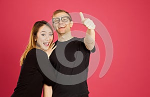 Attractive asian and caucasian inter racial couple giving the th photo