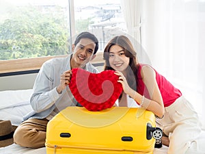 Attractive Asian couple lover ready to honeymoon trip, summer holiday vacation.