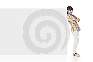 Attractive asian woman lean on blank board