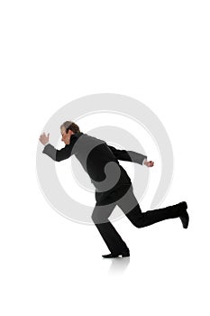 Attractive athletic businessman running