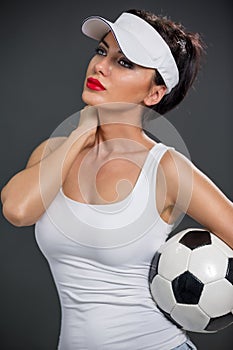 Attractive babe with soccer ball