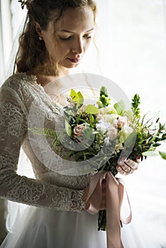 Attractive Beautiful Bride Holding Flowers Bouquet