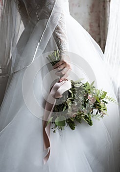 Attractive Beautiful Bride Holding Flowers Bouquet