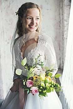 Attractive Beautiful Bride Holding Flowers Bouquet
