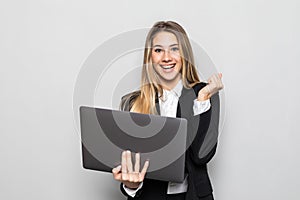 Attractive beautiful businesswoman get successful of business. Charming beautiful woman hold laptop and looking some information