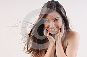 attractive beautiful woman with pure skin and strong healthy bright hair