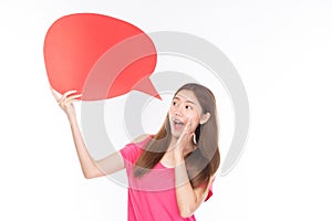 Attractive beautiful young asian woman smile and excited holding empty speech bubble on white background