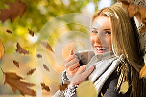 Attractive blond woman in the autumn sun