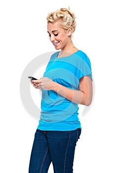 Attractive Blond Woman Texting on Cell Phone