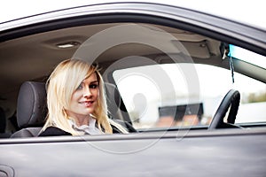 Attractive blonde behind the wheel