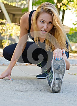Attractive blonde girl working out
