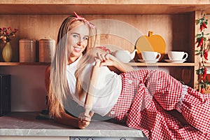 Woman Laying With Dough Trolley photo