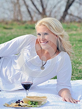 Attractive blonde woman picnic