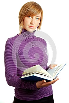 Attractive blonde woman reading a book