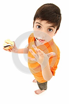 Attractive Boy Licking Chocolated Off Fingers