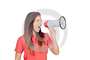 Attractive brunette girl shouting with a megaphone