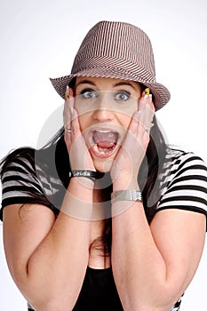 Attractive brunette woman with hat