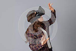 Attractive brunette woman testing virtual reality helmet