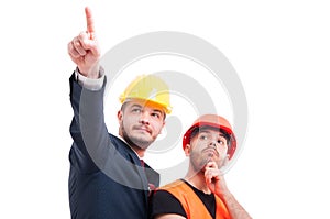 Attractive builder with businessman