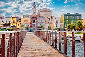 Attractive building on the shore of Lesina lake. photo