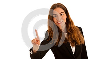 Attractive busienss woman pressing a virtua button isolated over