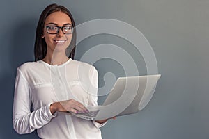 Attractive business lady with gadget